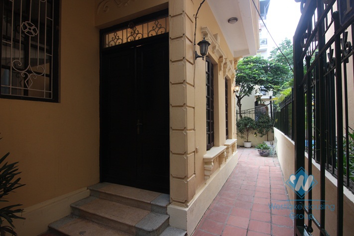 House for rent in Tay Ho alley with small yard large terrace