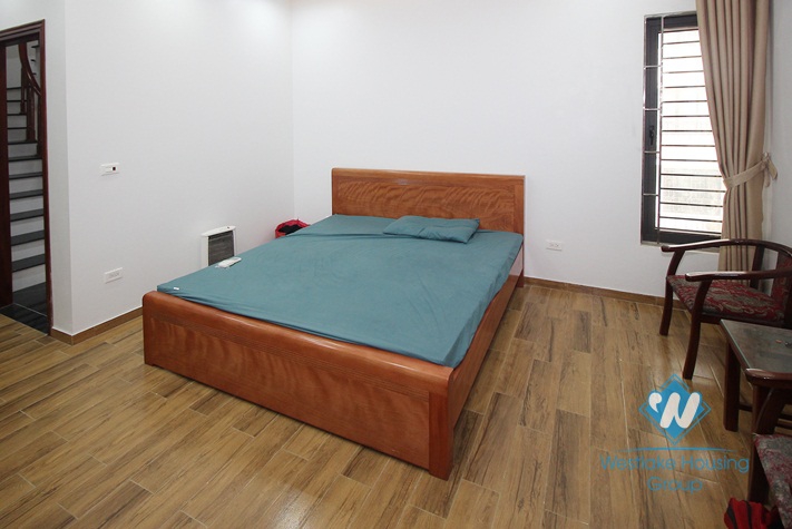 Good quality house with natural wooden furniture for rent in Ba Dinh