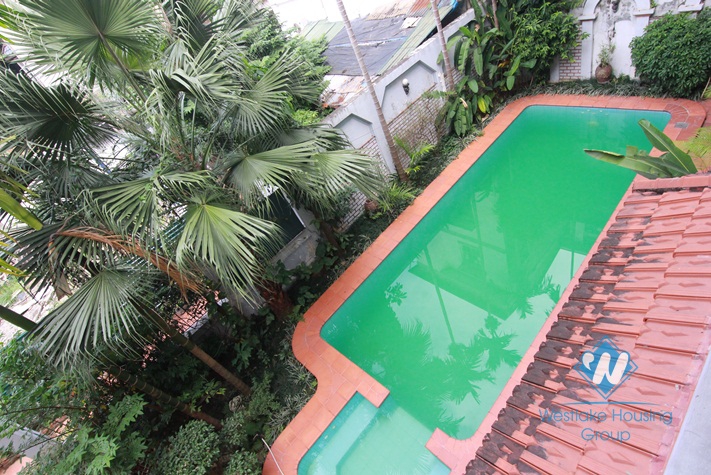 Charming house for rent in Tay Ho with garden yard and swimming pool, available now