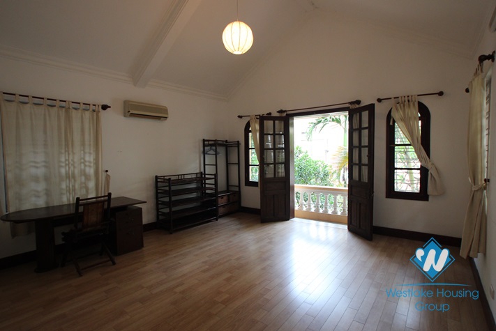 Charming house with big yard for lease in Nghi Tam Village,Tay Ho, Ha Noi