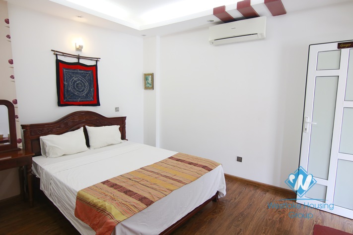 Bright and Fully Furnished One Bedrooms Apartment for rent in Doi Can st, Ba Dinh district.