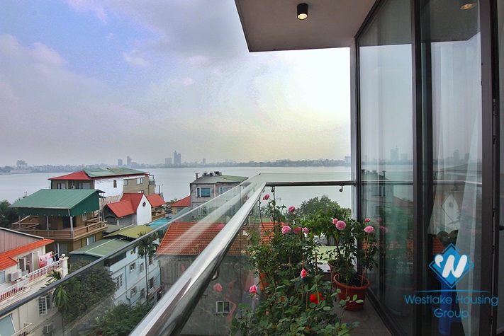 A three-bedroom duplex with lake view on the top floor on Dang Thai Mai street 