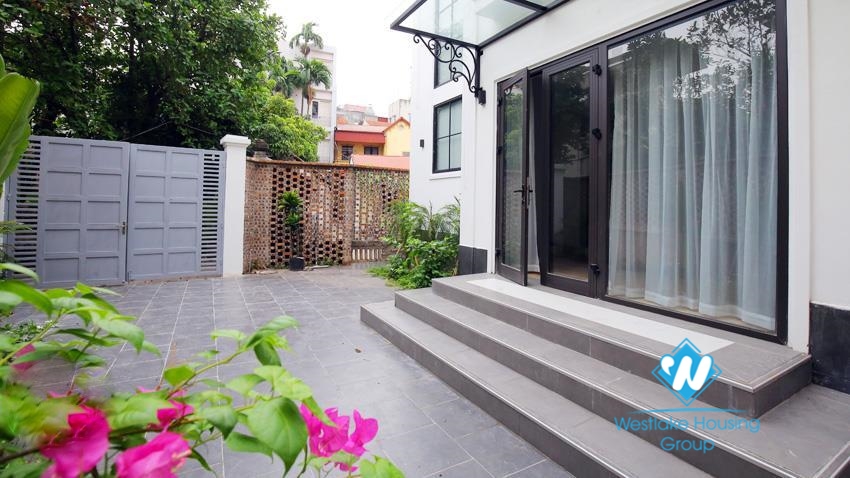 House for rent with four bedrooms and yard around the house in An Duong Vuong, Tay Ho