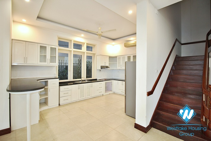 Unfurnished house with big yard for rent in To Ngoc Van st, Tay Ho