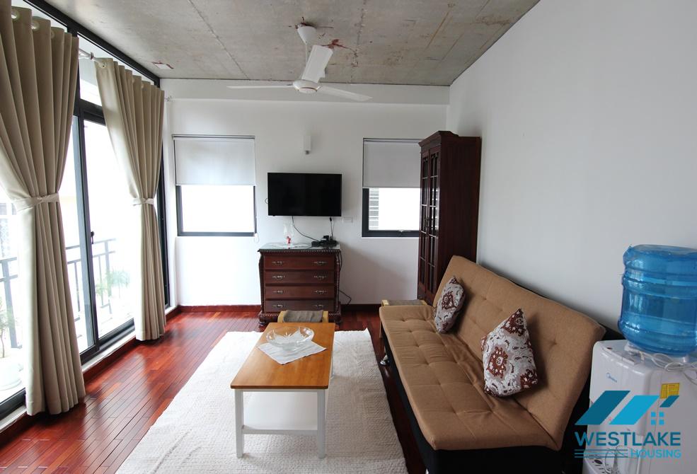 A nice 1 bedroom+1 working room on Tay Ho street for rent