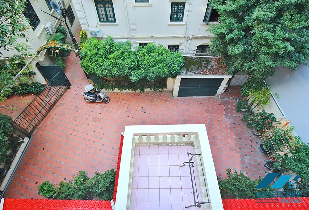 Charming house with nice design and big yard for rent in To Ngoc Van, Tay Ho, Ha Noi