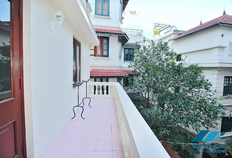 Charming house with nice design and big yard for rent in To Ngoc Van, Tay Ho, Ha Noi