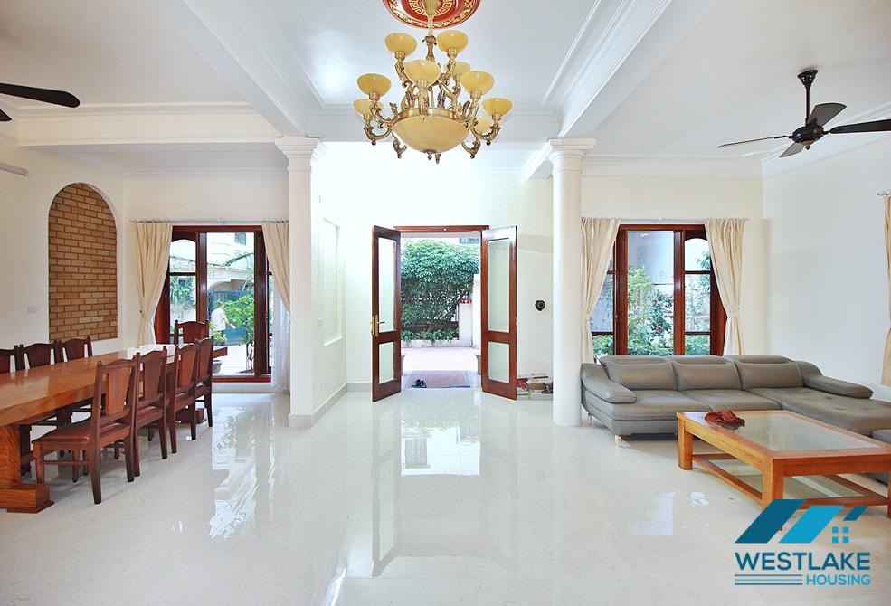 Charming house with nice design and big yard for rent in To Ngoc Van, Tay Ho, Ha Noi