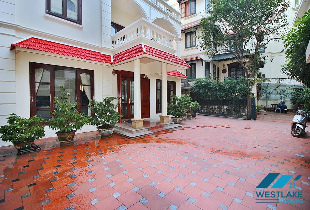 Charming house with nice design and big yard for rent in To Ngoc Van, Tay Ho, Ha Noi