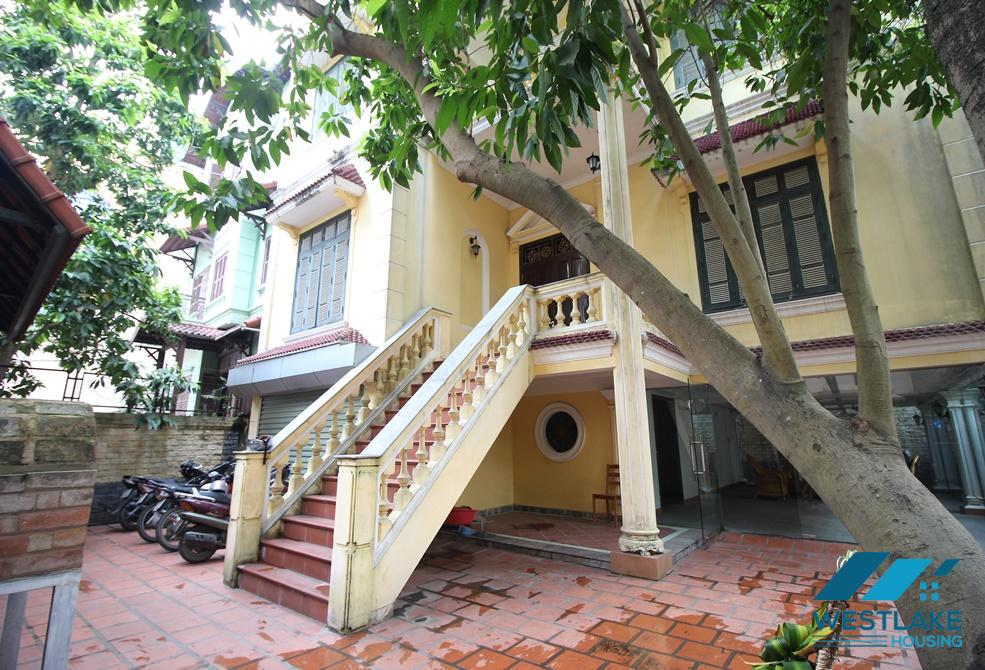  Spacious villa rental with big yard and balcony in the heart of Tay Ho, Ha Noi