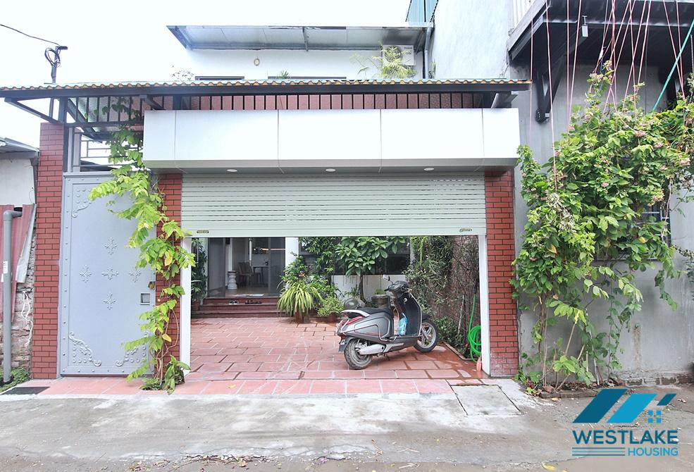 Green house with big yard for rent in An Duong, Tay Ho area