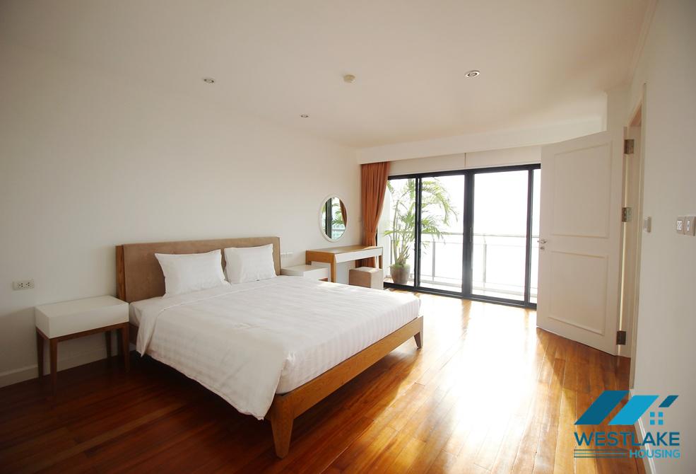 Wonderful apartment with stunning lakeview, nice furniture, outdoor swimming pool and gym for rent in Tay Ho, Ha Noi