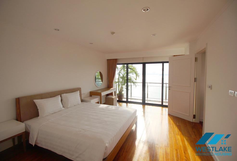 Wonderful apartment with stunning lakeview, nice furniture, outdoor swimming pool and gym for rent in Tay Ho, Ha Noi