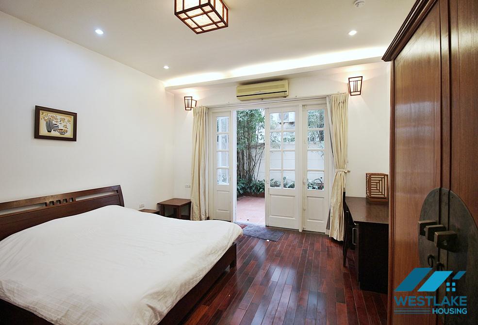 Serviced 02 bedroom apartment with back yard for rent on Xuan Dieu street, Tay Ho, Ha Noi