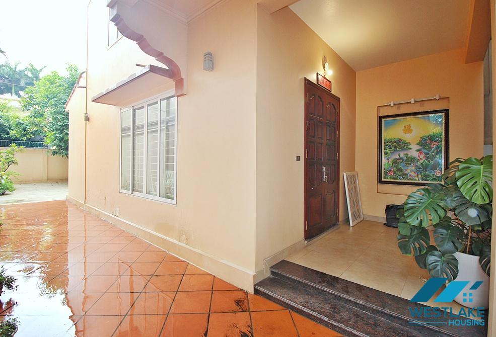 Unfurnished garden 4 bedrooms house for rent in Dang Thai Mai, Tay Ho, Ha Noi