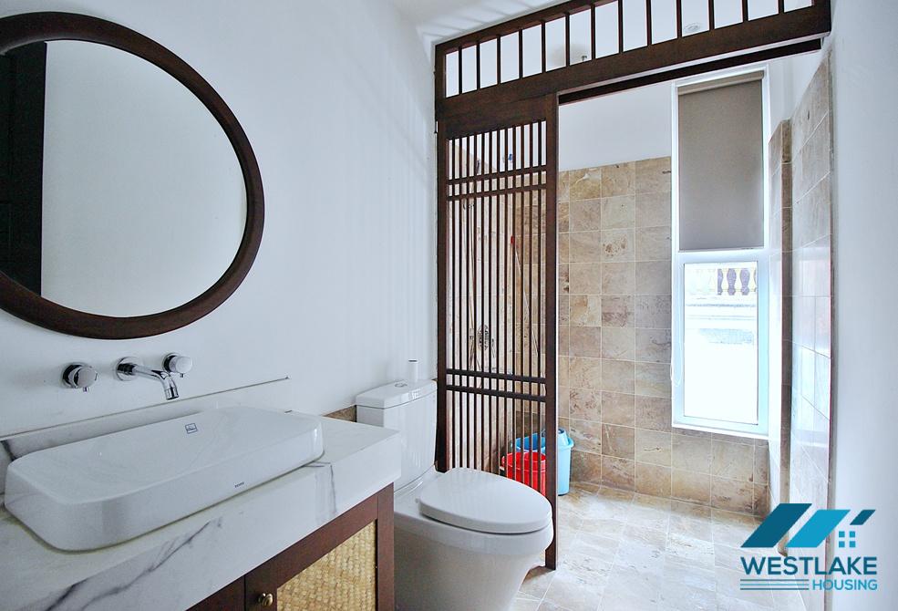 Renovated 4 bedrooms serviced apartment for rent in Dang Thai Mai area, Tay Ho, Ha Noi