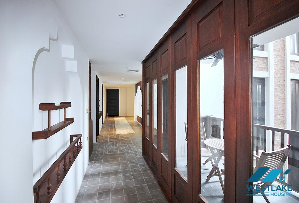 Renovated 4 bedrooms serviced apartment for rent in Dang Thai Mai area, Tay Ho, Ha Noi