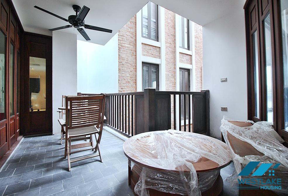 Renovated 4 bedrooms serviced apartment for rent in Dang Thai Mai area, Tay Ho, Ha Noi