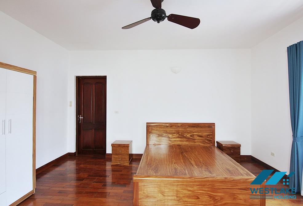 Lovely 04 bedrooms house with big yard for rent in To ngoc Van, Tay Ho, Ha Noi