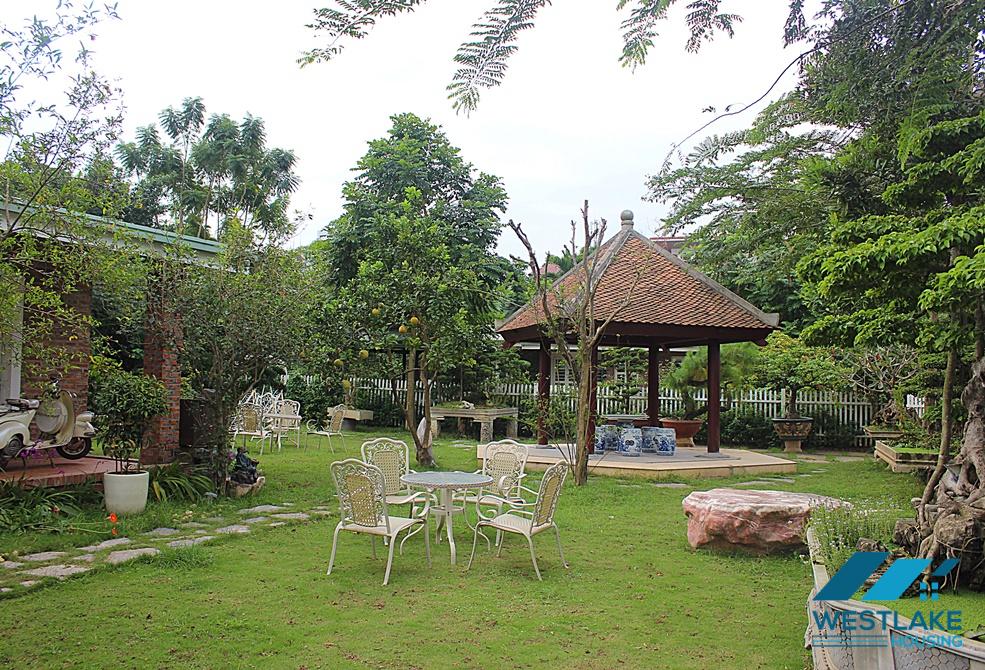 A house with big garden for rent in An Duong, Tay Ho, Ha Noi