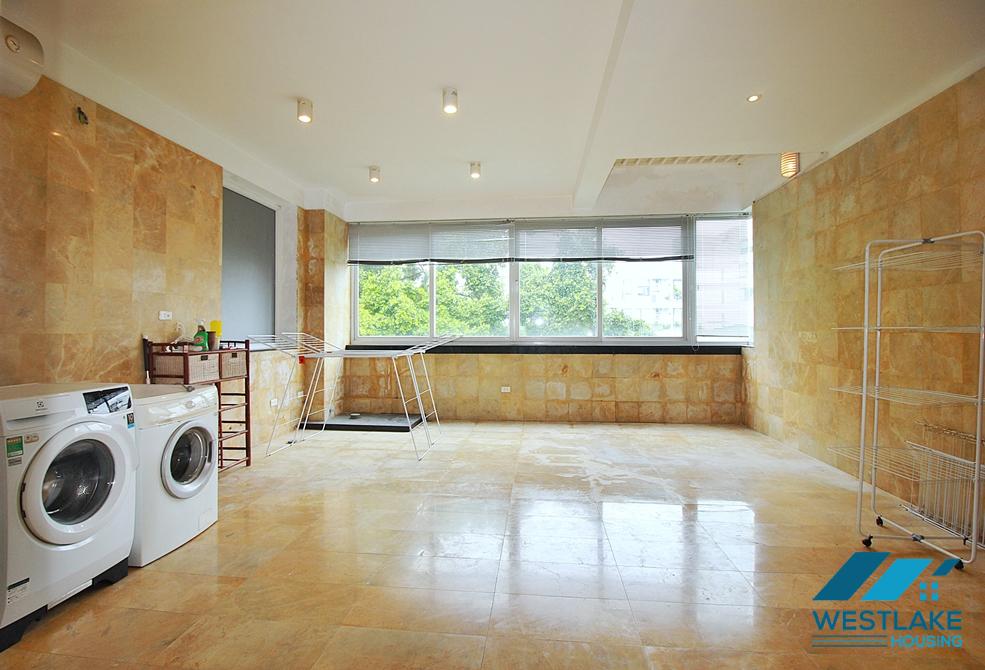 Semi-furnished 4 bedrooms house with big yard for rent in Tay Ho ward, Ha Noi