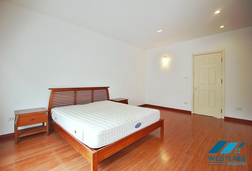 Semi-furnished 4 bedrooms house with big yard for rent in Tay Ho ward, Ha Noi