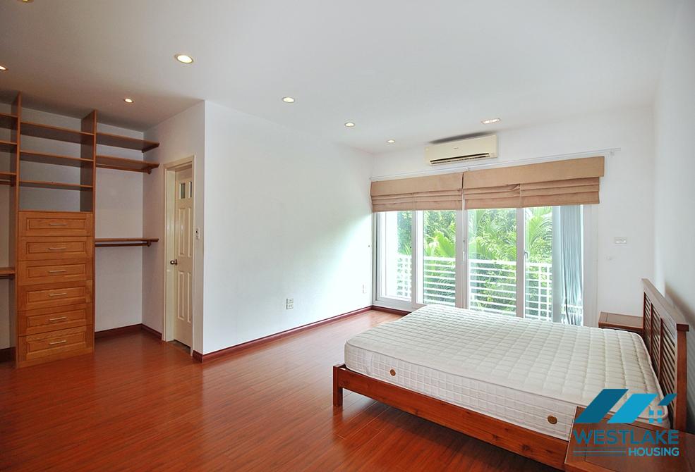 Semi-furnished 4 bedrooms house with big yard for rent in Tay Ho ward, Ha Noi