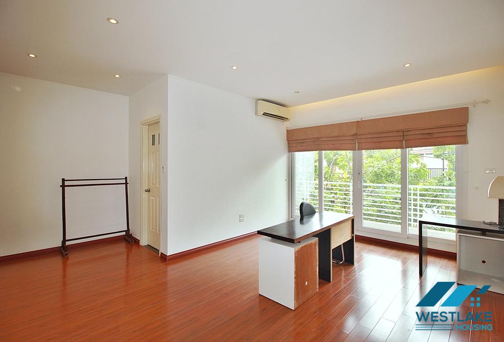 Semi-furnished 4 bedrooms house with big yard for rent in Tay Ho ward, Ha Noi