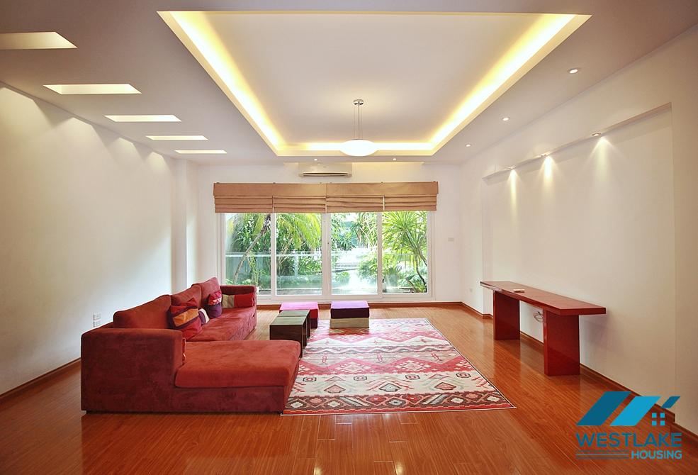Semi-furnished 4 bedrooms house with big yard for rent in Tay Ho ward, Ha Noi