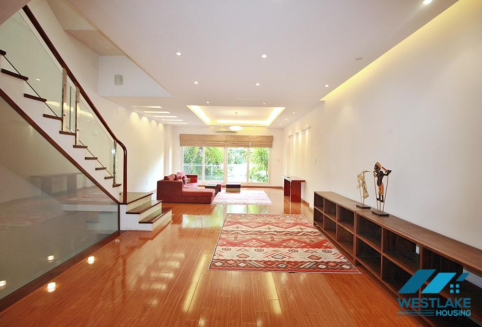 Semi-furnished 4 bedrooms house with big yard for rent in Tay Ho ward, Ha Noi