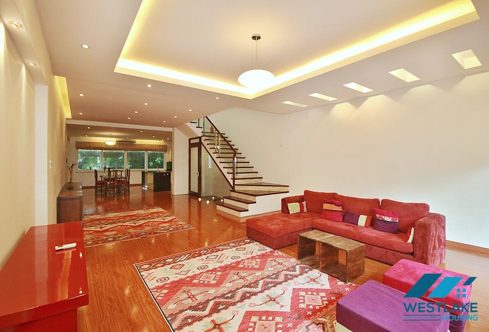Semi-furnished 4 bedrooms house with big yard for rent in Tay Ho ward, Ha Noi
