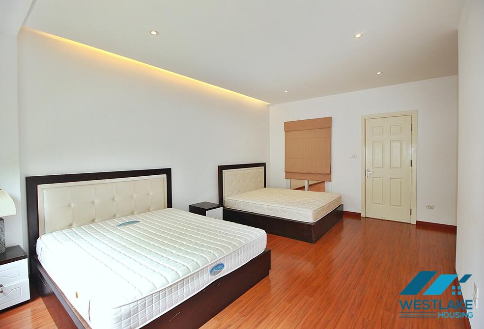 Semi-furnished 4 bedrooms house with big yard for rent in Tay Ho ward, Ha Noi
