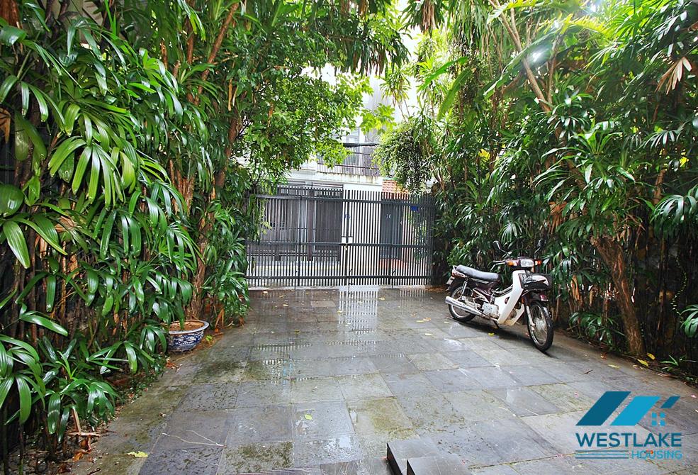 Semi-furnished 4 bedrooms house with big yard for rent in Tay Ho ward, Ha Noi