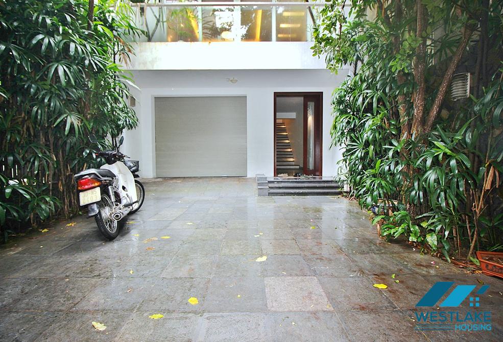 Semi-furnished 4 bedrooms house with big yard for rent in Tay Ho ward, Ha Noi