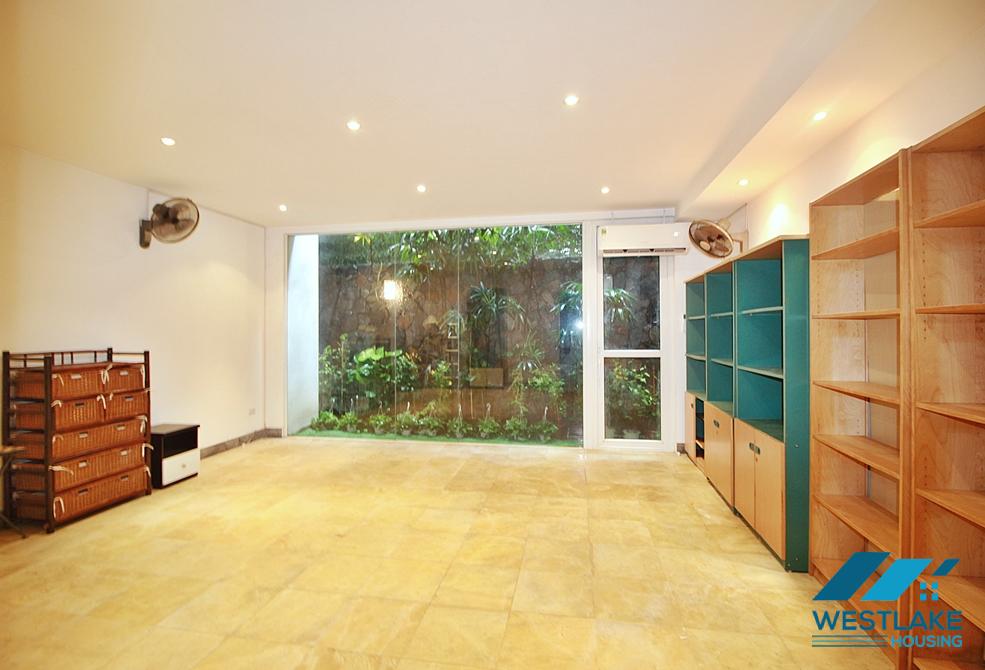 Semi-furnished 4 bedrooms house with big yard for rent in Tay Ho ward, Ha Noi