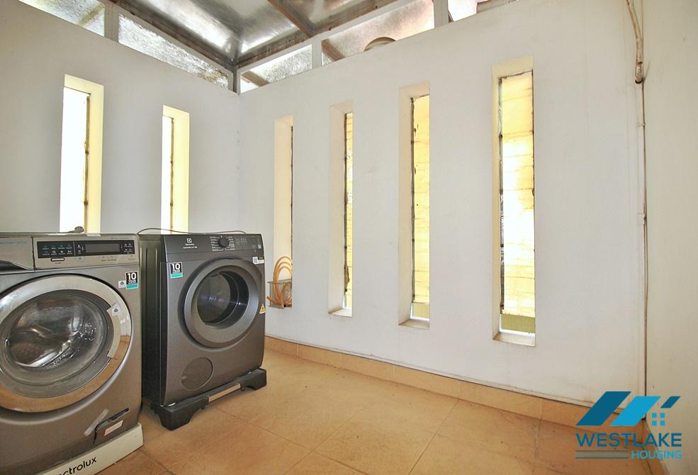 A nice 4 bedroom house for rent with big yard in Tay Ho, Ha Noi