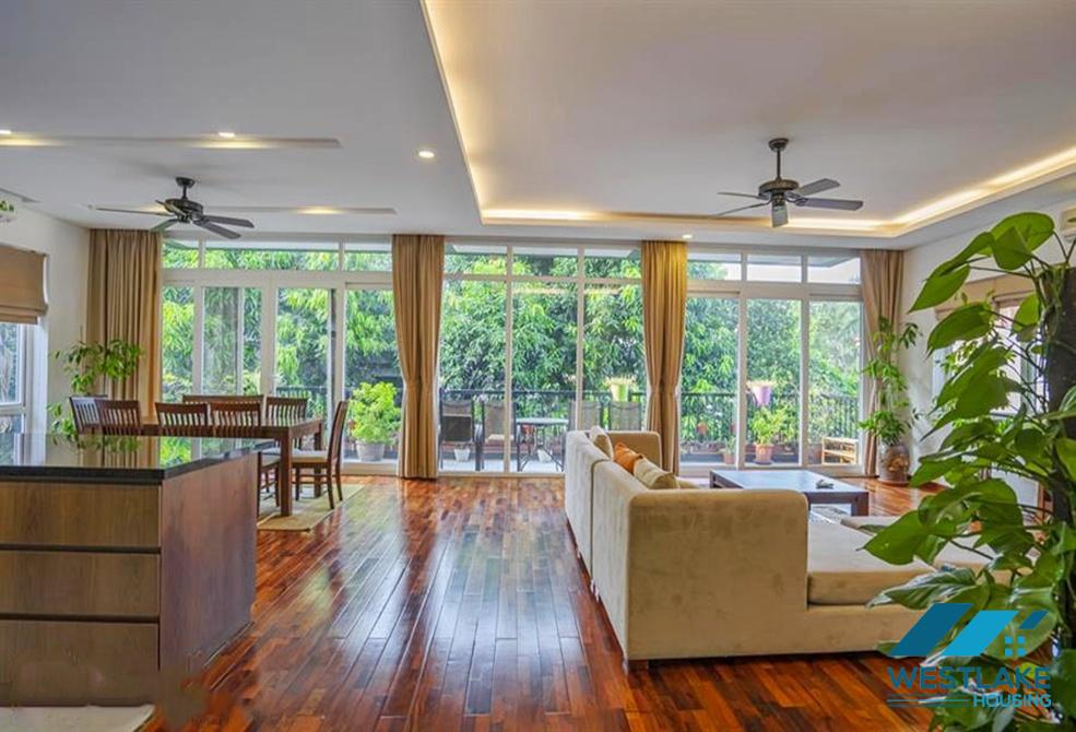A green and airy four bedrooms apartment for rent in Au Co street, Tay Ho, Ha Noi