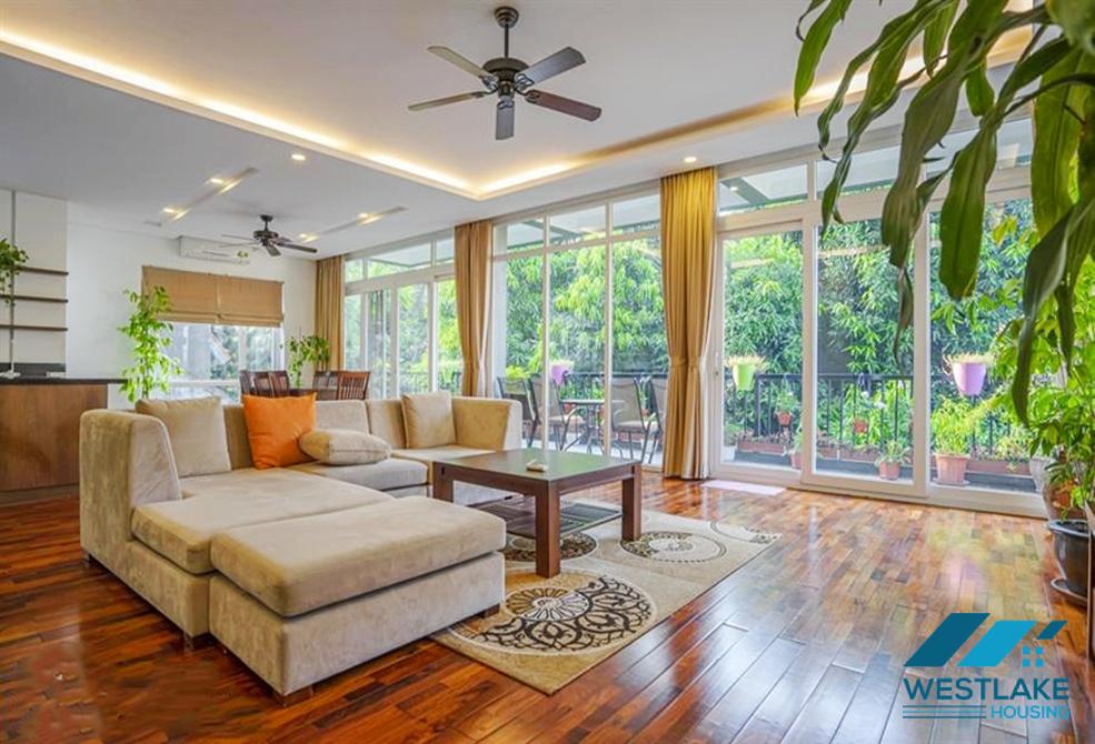 A green and airy four bedrooms apartment for rent in Au Co street, Tay Ho, Ha Noi