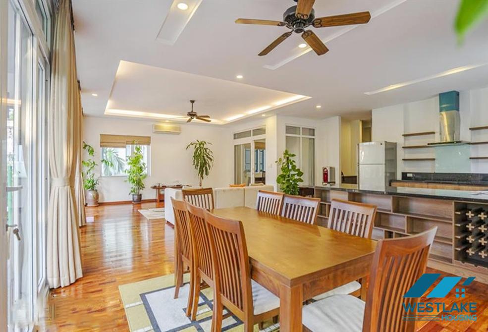 A green and airy four bedrooms apartment for rent in Au Co street, Tay Ho, Ha Noi