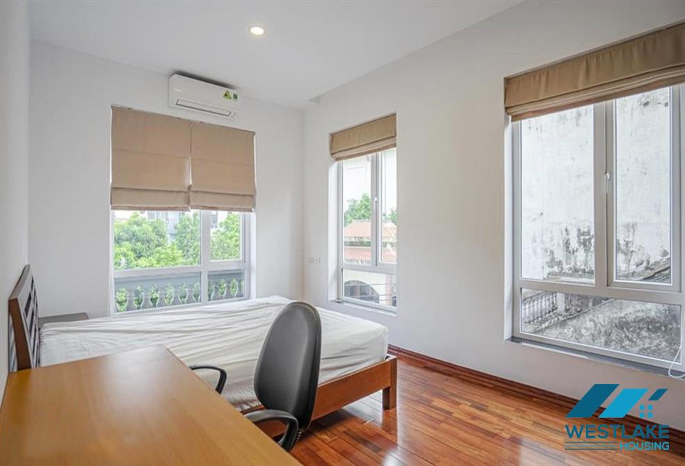 A green and airy four bedrooms apartment for rent in Au Co street, Tay Ho, Ha Noi