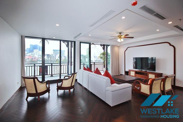 Beautiful, spacious 4-bedroom apartment with a large balcony and lake view for rent in Tu Hoa, Tay Ho, Hanoi.
