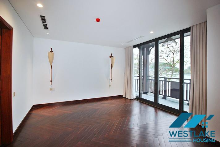 Brand new, modern 4-bedroom apartment for rent with a large balcony overlooking the lake in Tu Hoa, Tay Ho, Hanoi.