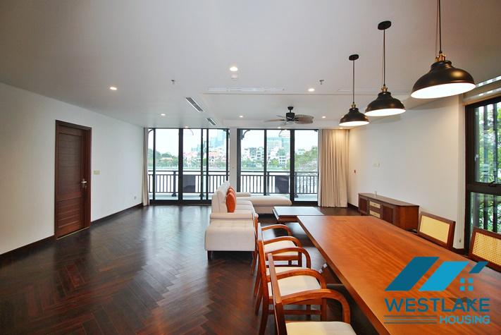 Brand new, modern 4-bedroom apartment for rent with a large balcony overlooking the lake in Tu Hoa, Tay Ho, Hanoi.