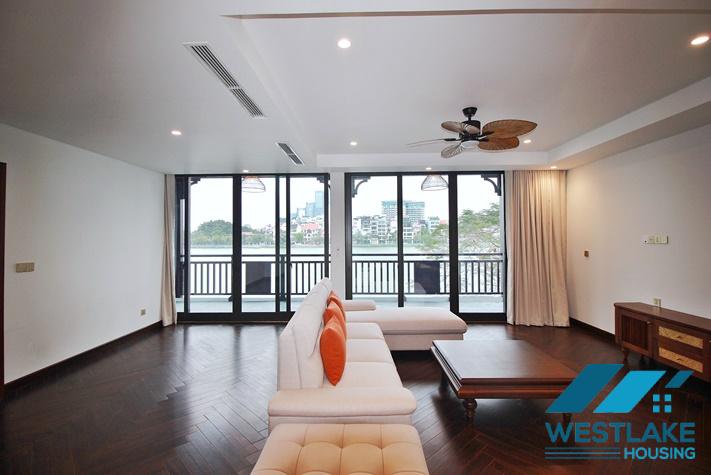 Brand new, modern 4-bedroom apartment for rent with a large balcony overlooking the lake in Tu Hoa, Tay Ho, Hanoi.