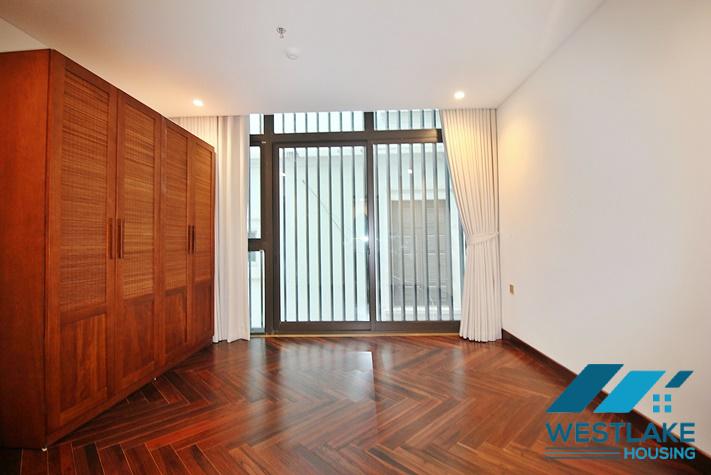 Brand new, modern 4-bedroom apartment for rent with a large balcony overlooking the lake in Tu Hoa, Tay Ho, Hanoi.