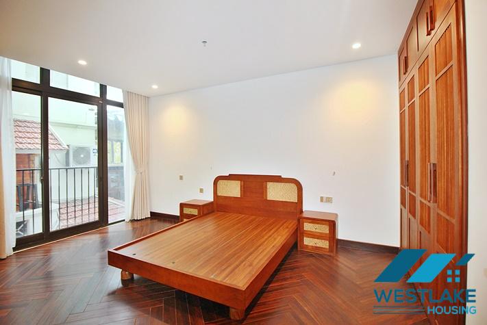 Brand new, modern 4-bedroom apartment for rent with a large balcony overlooking the lake in Tu Hoa, Tay Ho, Hanoi.
