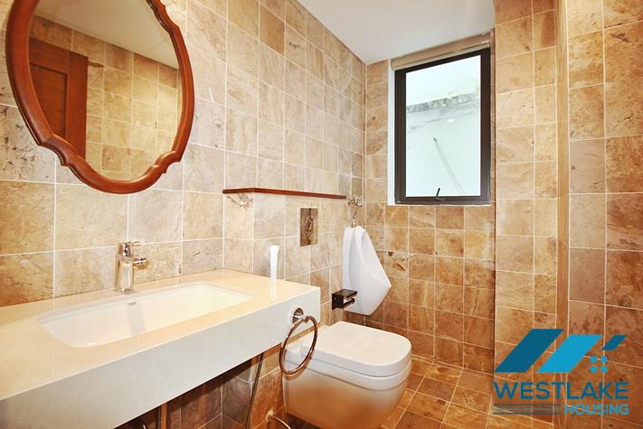 Brand new, modern 4-bedroom apartment for rent with a large balcony overlooking the lake in Tu Hoa, Tay Ho, Hanoi.