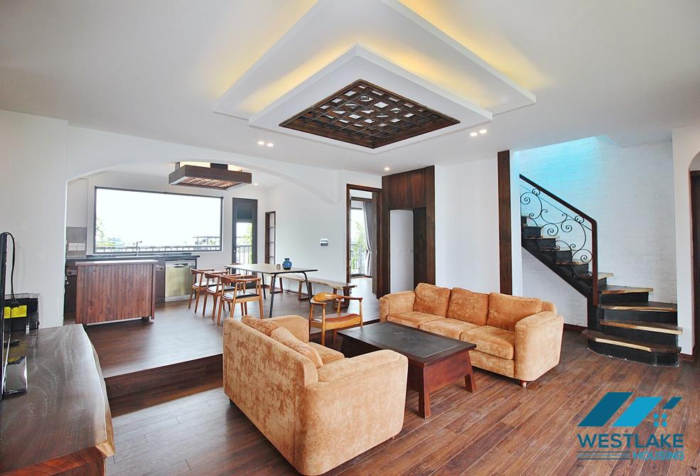 Lake view 4 bedrooms duplex apartment for rent in To Ngoc Van st, Tay Ho, Ha Noi