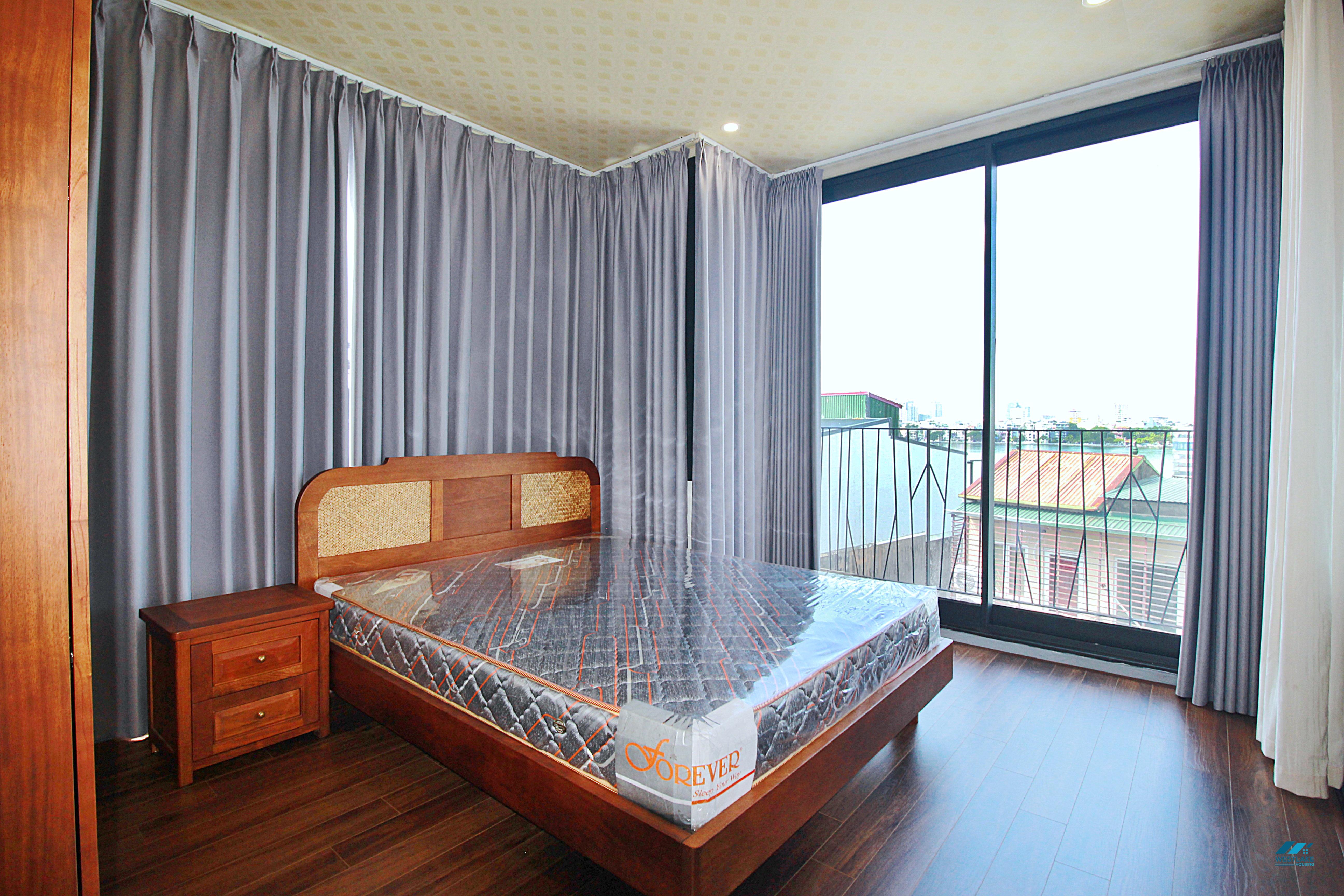 Lake view two bedrooms apartment for lease in Xom Phu, Dang Thai Mai area, Ha Noi